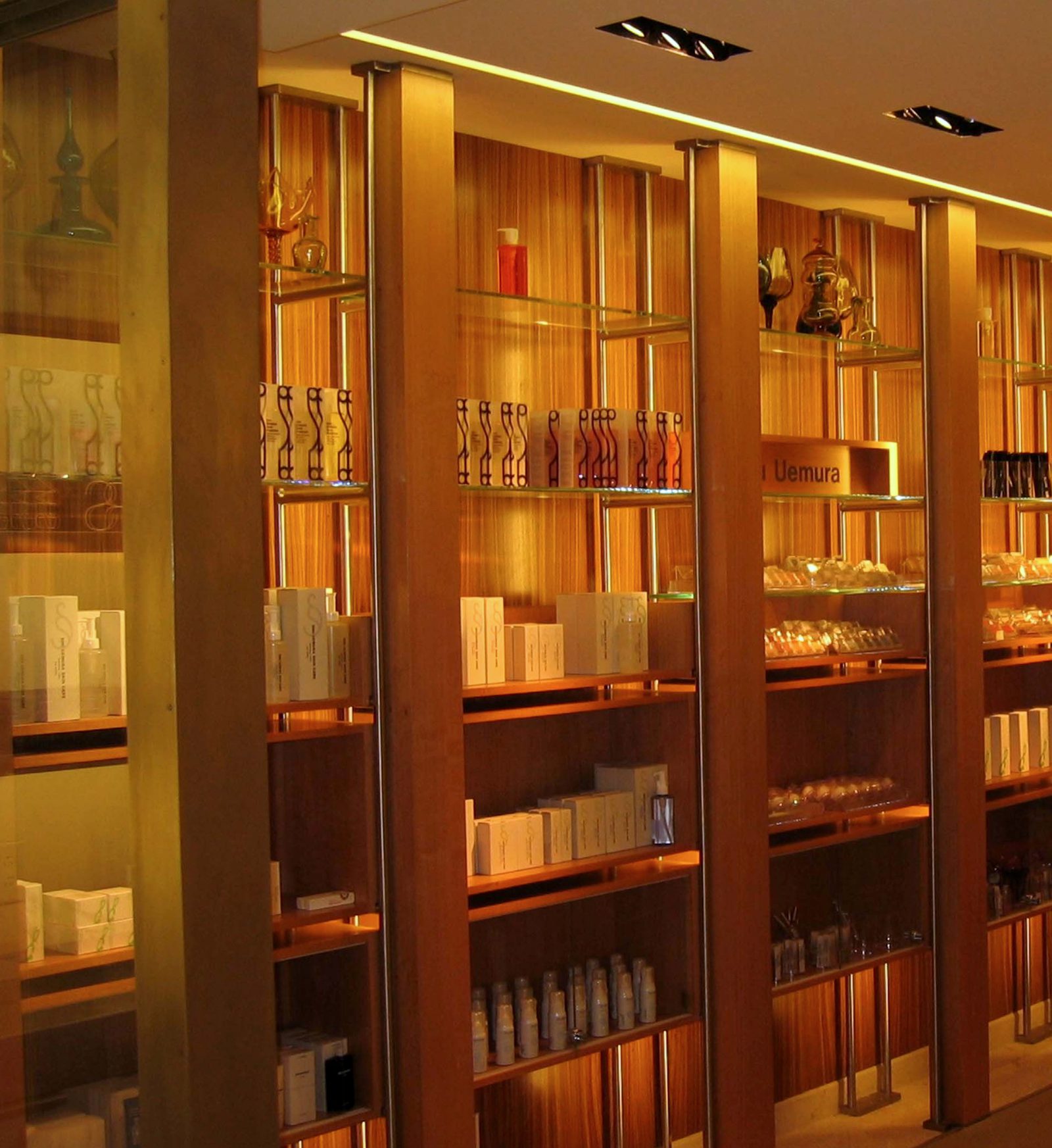 Full wall height retail display shelves