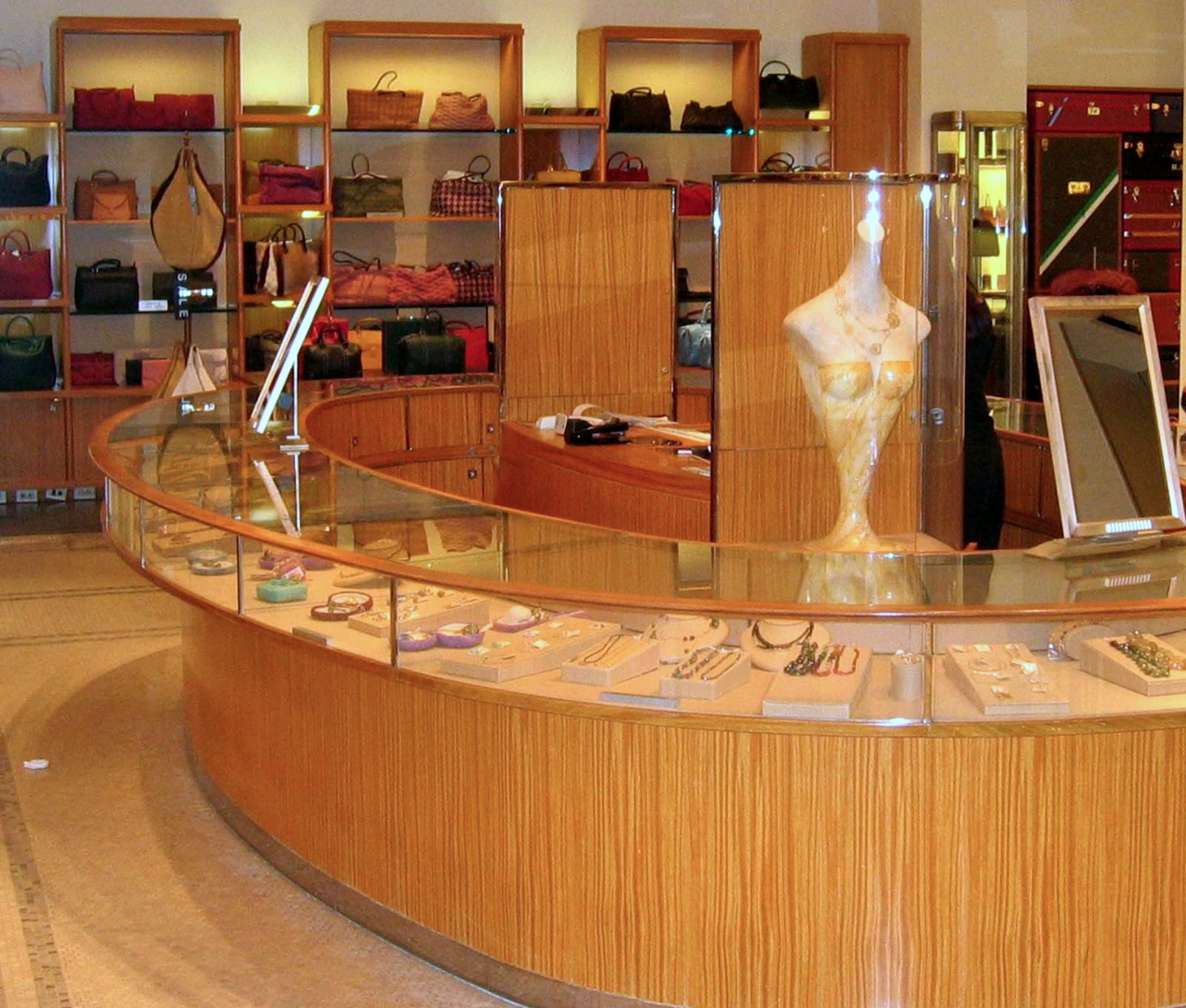 Interior store with curved wooden display cases